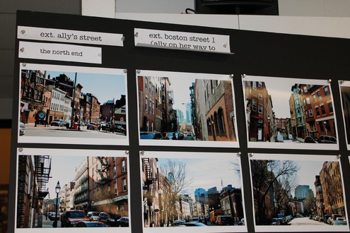 Poster boards with North End street scenes.
