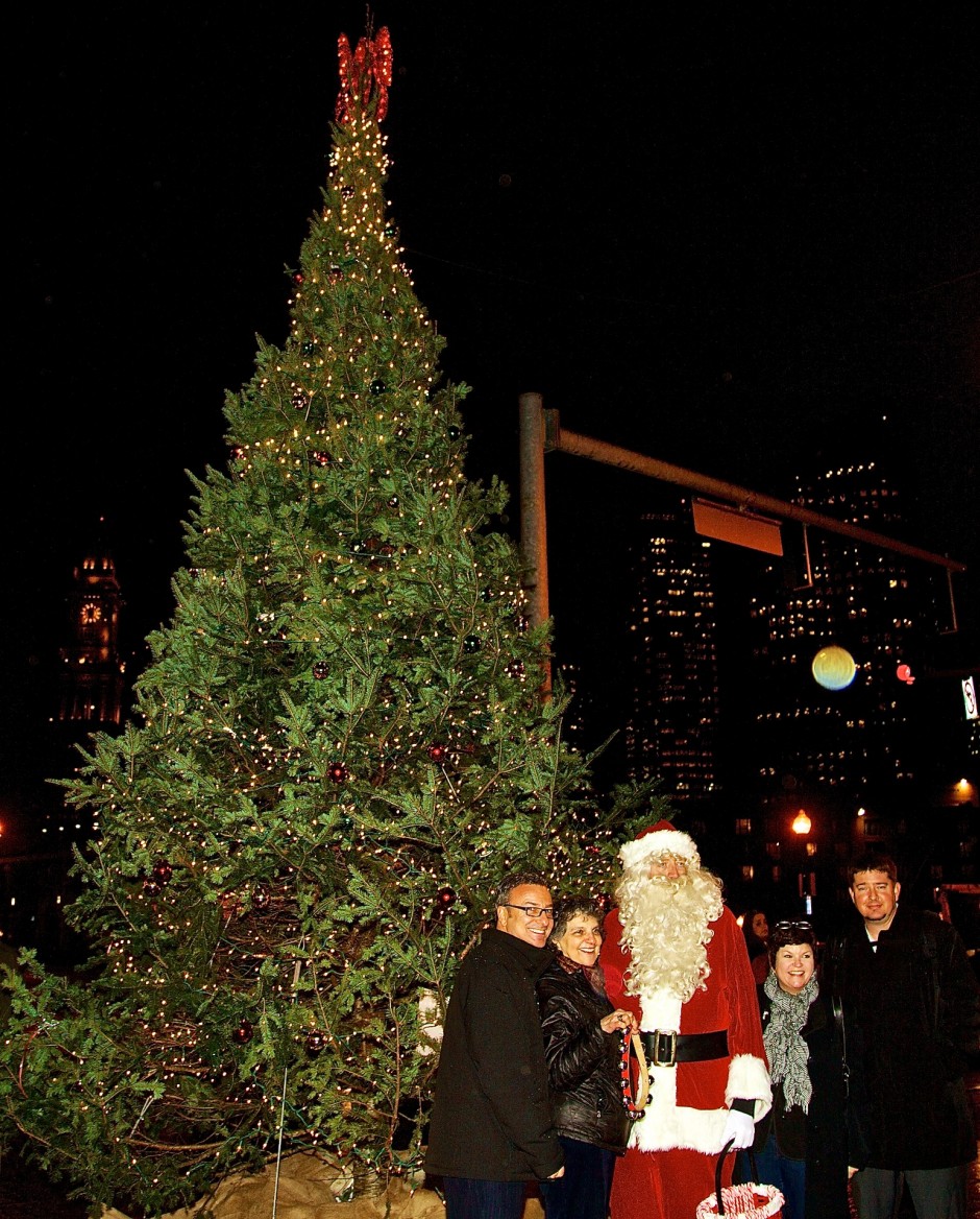City Councilor Sal LaMattina (left) and Santa with the NE Beautification Committee, Patricia, Alison and David