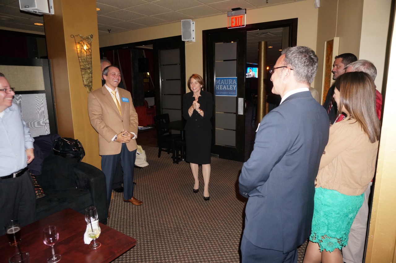 Healey speaking to the group