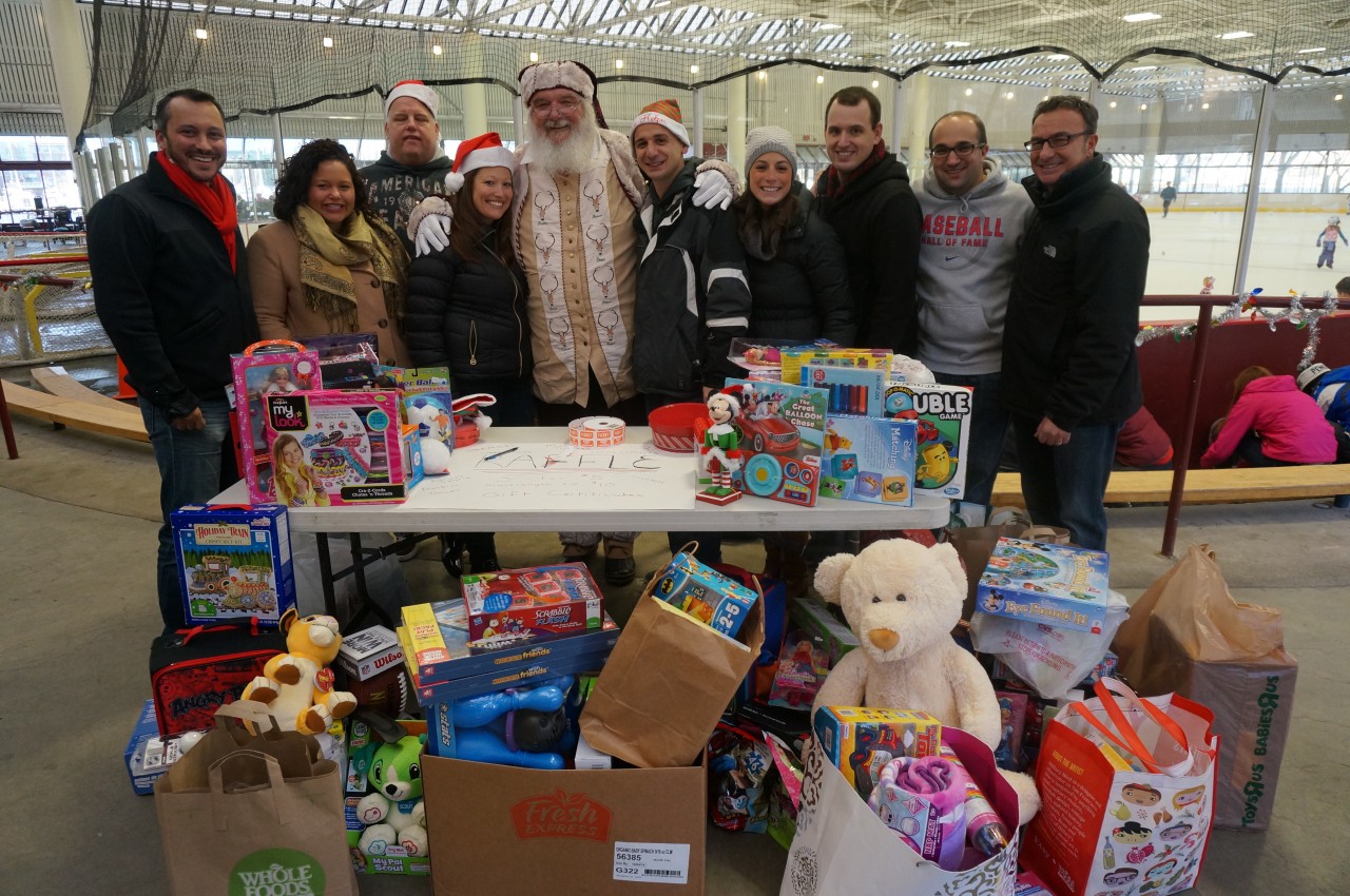 Toys filled the front table along with volunteers